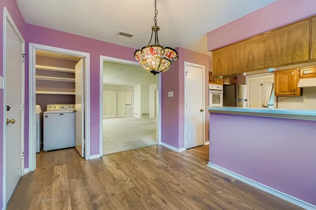 a view of a room with a chandelier