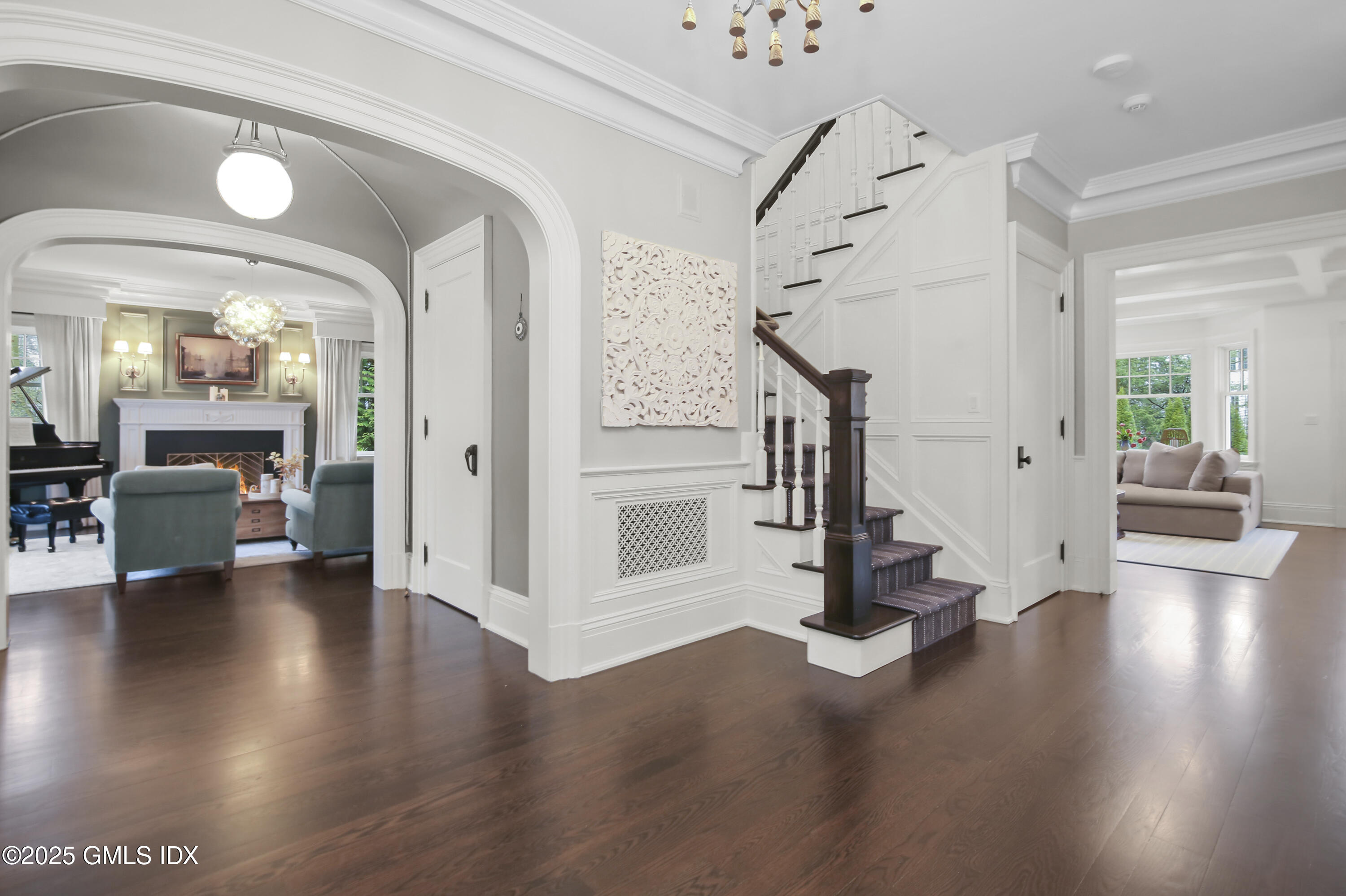 45 Willow Road Riverside, CT 06878 - Photo 3 of 14 a view of a hallway with wooden floor windows and a kitchen