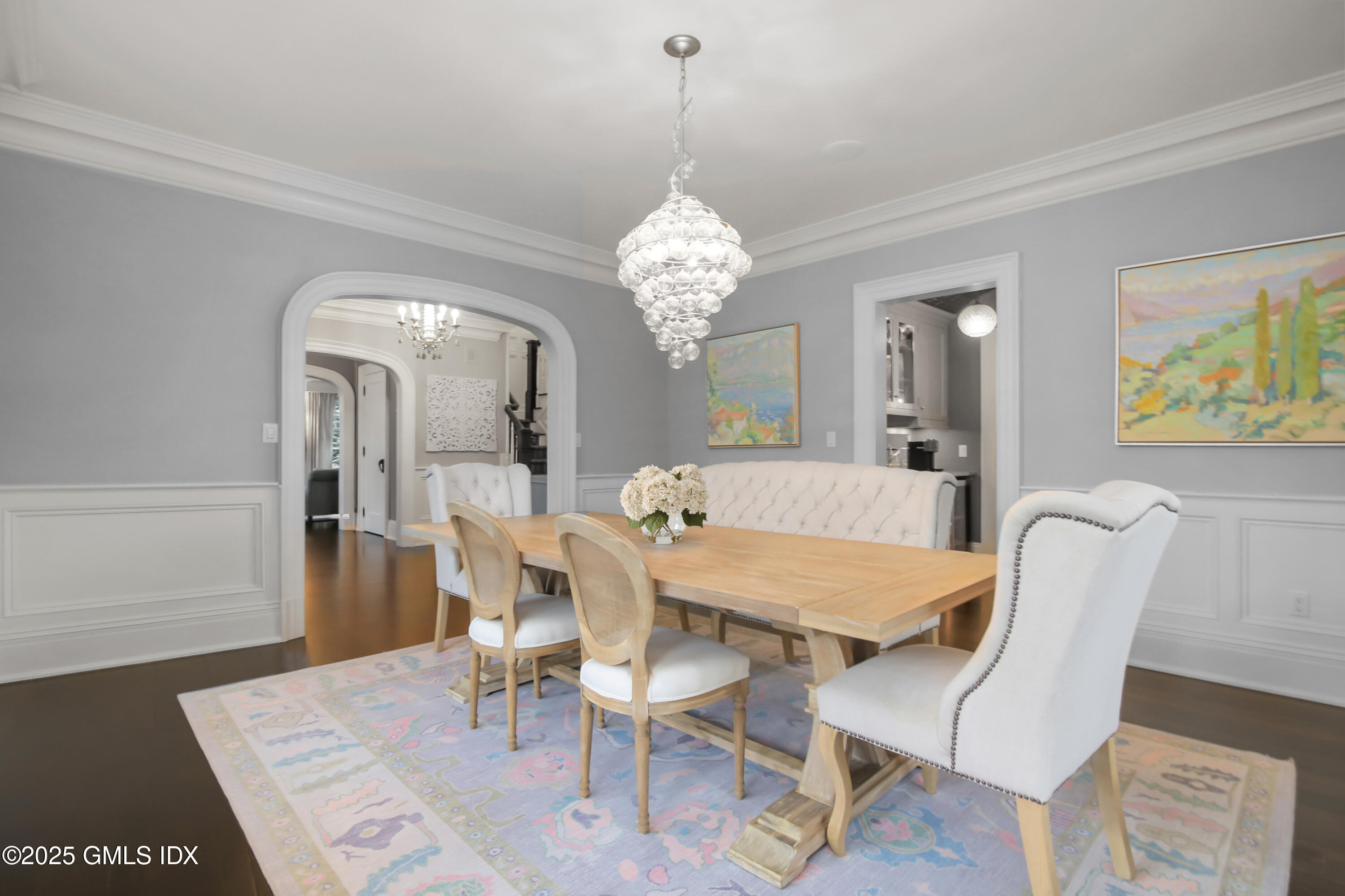 45 Willow Road Riverside, CT 06878 - Photo 5 of 14 a view of a dining room with furniture and chandelier