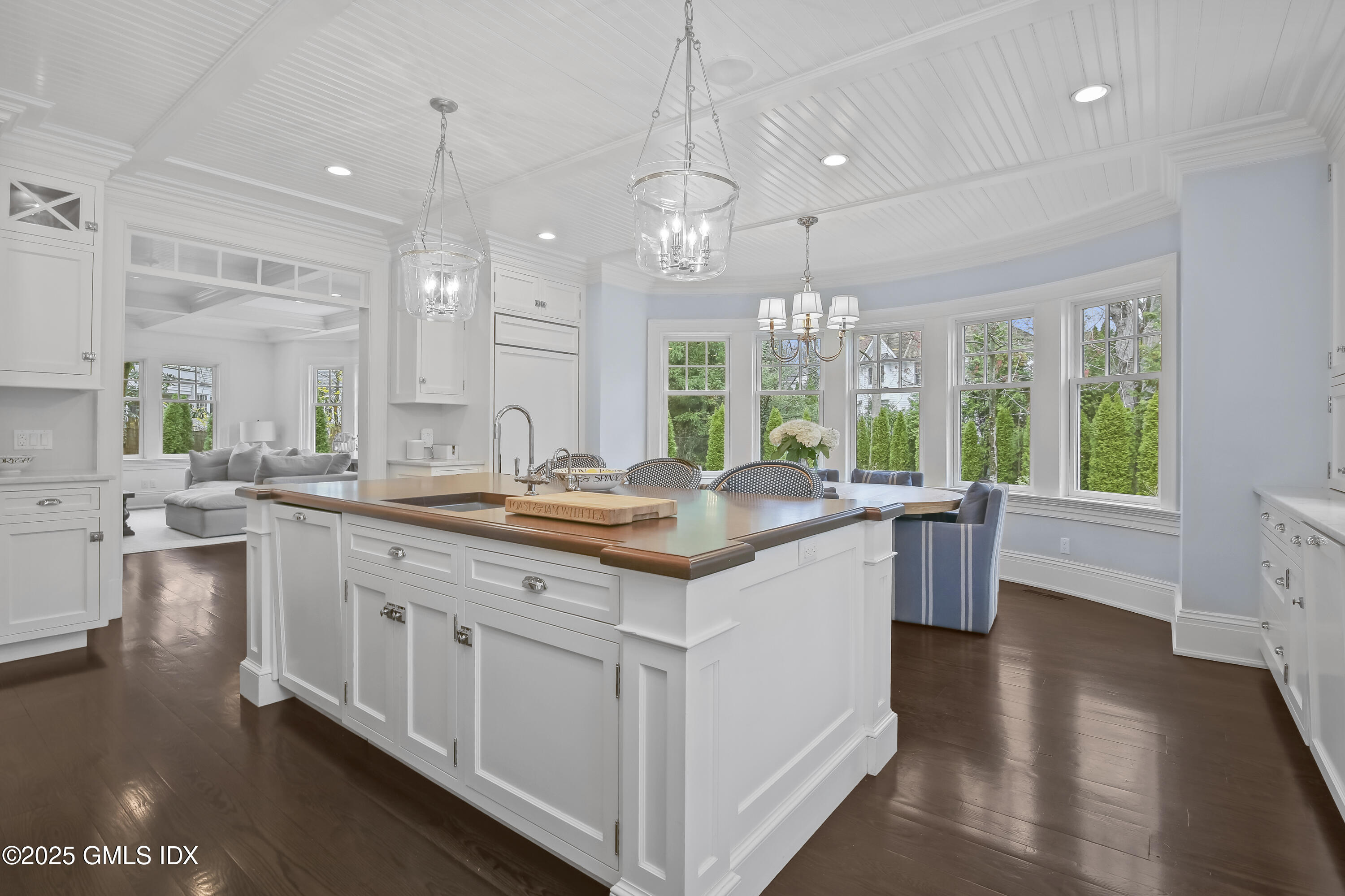 45 Willow Road Riverside, CT 06878 - Photo 6 of 14 a kitchen with center island and large windows