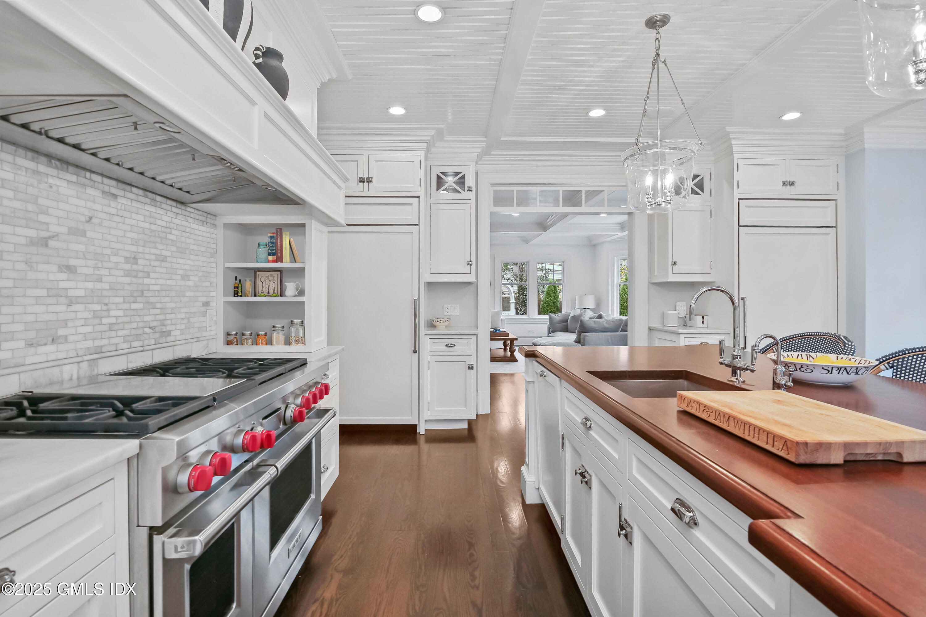 45 Willow Road Riverside, CT 06878 - Photo 7 of 14 a kitchen with stainless steel appliances granite countertop a sink stove and cabinets