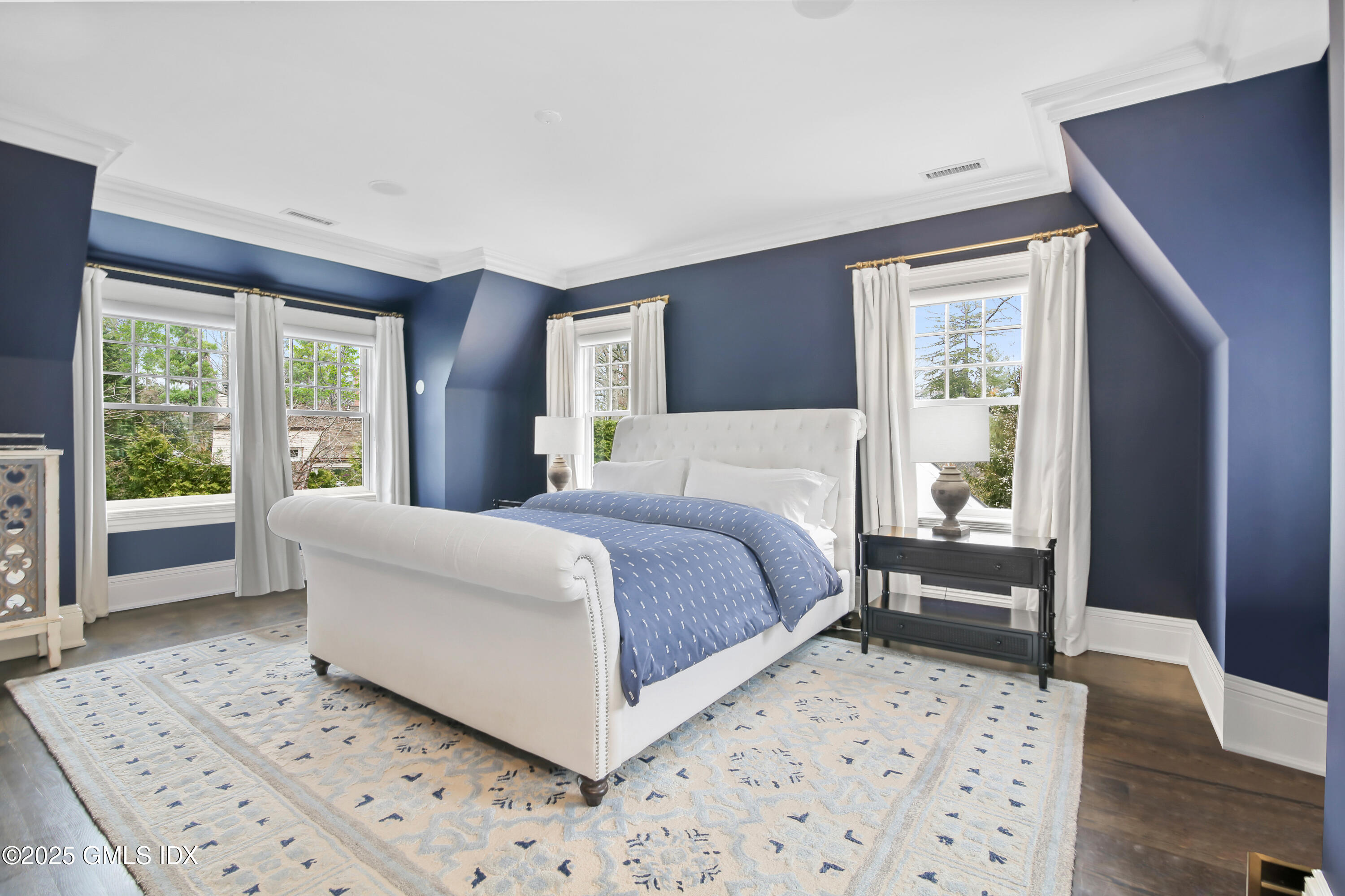 45 Willow Road Riverside, CT 06878 - Photo 9 of 14 a bedroom with a large bed and a window