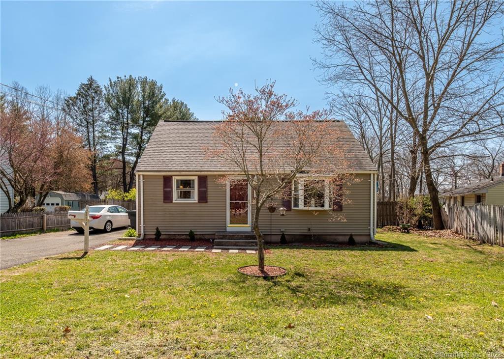 114 Brainard Road Enfield, CT 06082 - Photo 1 of 1 a house that has a big yard with large trees