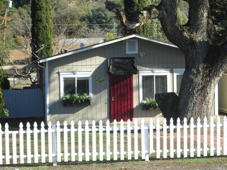 6876 Frontage Road Lucerne, CA 95458 - Photo 1 of 1 Cute front unit of two units. Has kitchen on left, bar and eating area behind kitchen. Two bedrooms or one bedroom and a living room on right. Lots of windows and light.