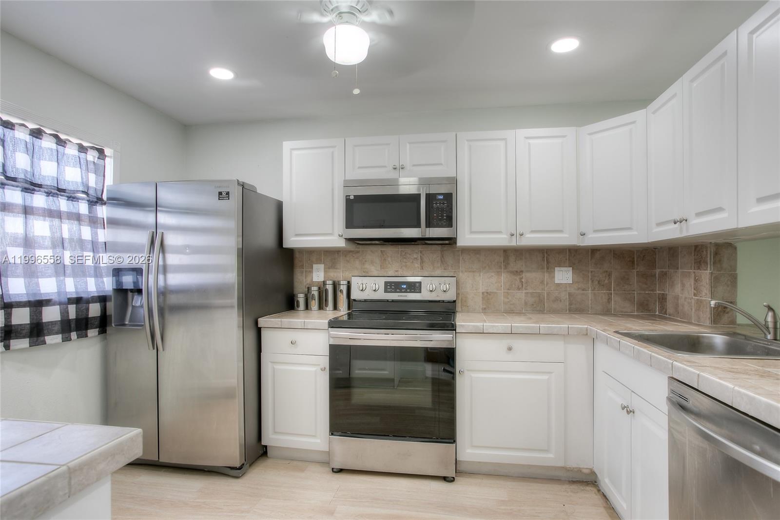 8810 West McNab Road, Unit 306 Tamarac, FL 33321 - Photo 2 of 11