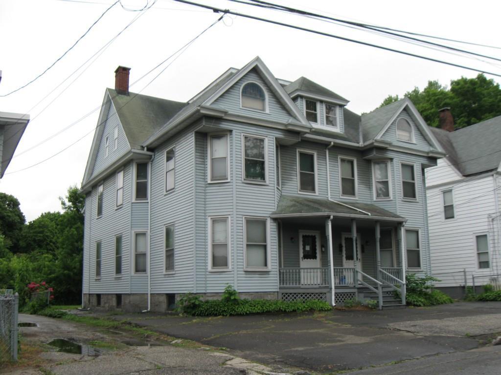 81 High Street Ansonia, CT 06401 - Photo 1 of 1 a front view of a house with a yard