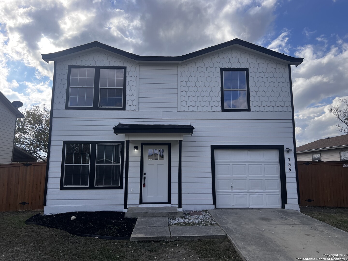 735 Inks Farm San Antonio, TX 78228 - Photo 2 of 17 a front view of a house with a yard