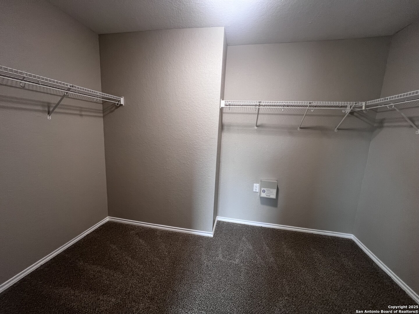 735 Inks Farm San Antonio, TX 78228 - Photo 10 of 17 a view of an empty walk in closet