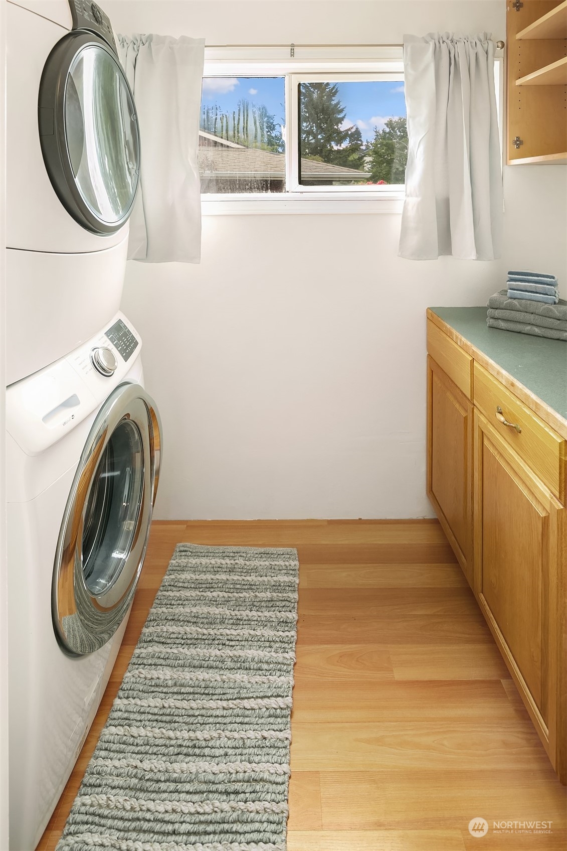 2919 Stafford Way Bothell, WA 98012 - Photo 17 of 30 a view of a kitchen with washer and dryer