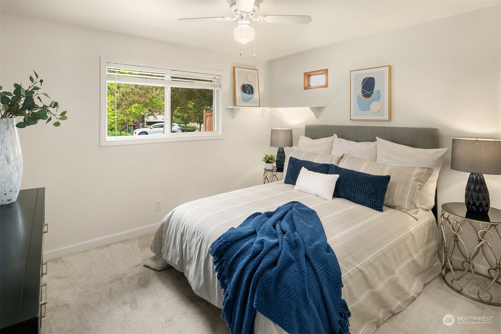 2919 Stafford Way Bothell, WA 98012 - Photo 21 of 30 a bedroom with a bed and a window