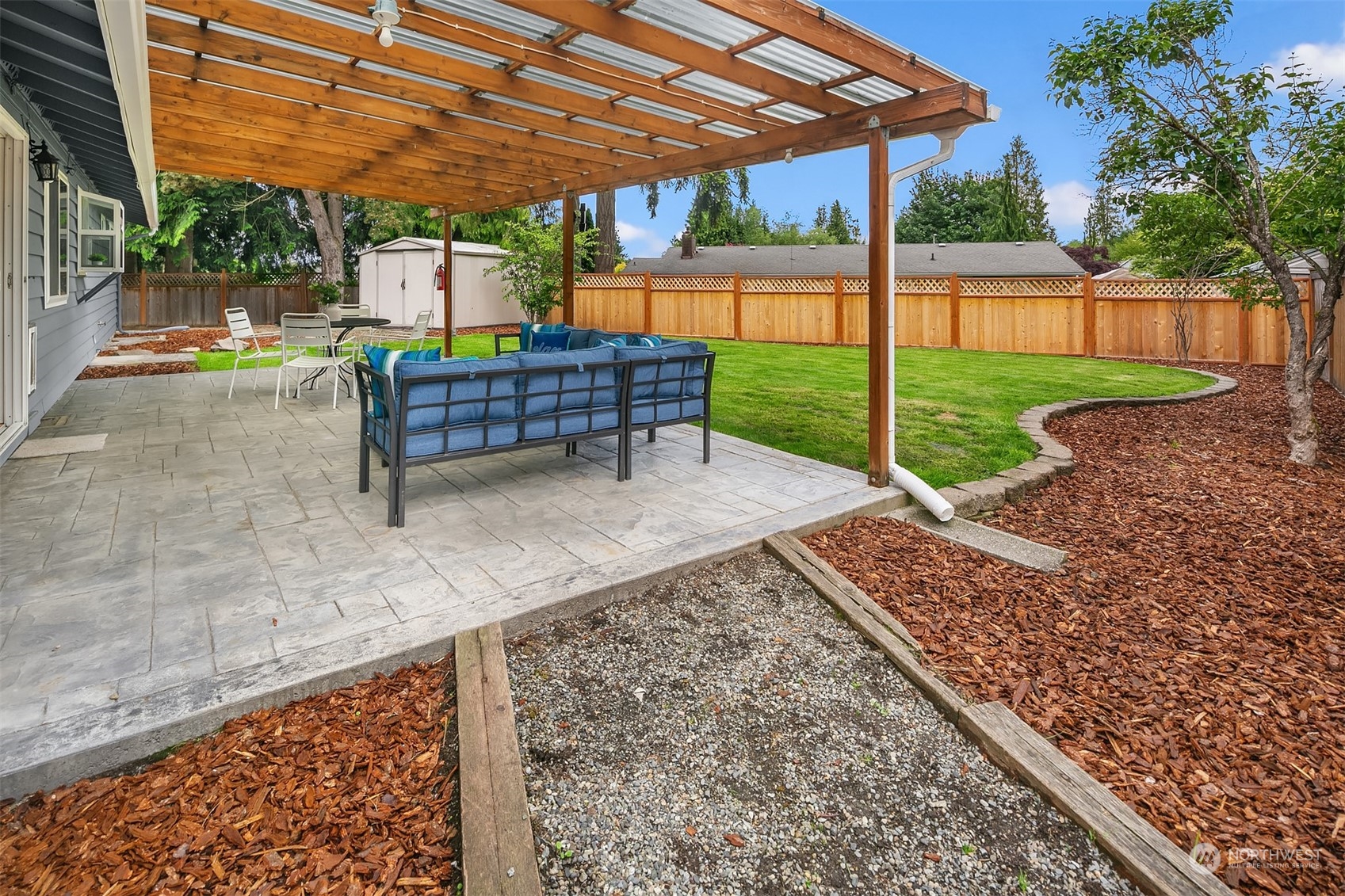 2919 Stafford Way Bothell, WA 98012 - Photo 25 of 30 a view of a backyard with wooden floor barbeque oven and a yard