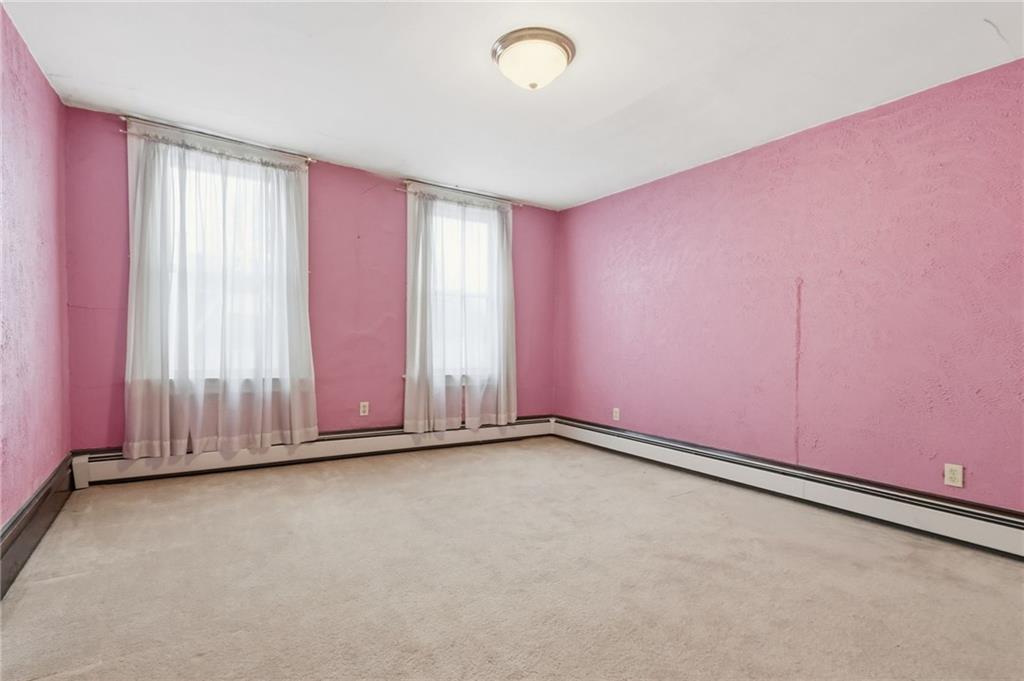 373 Copperfield Avenue Pittsburgh, PA 15210 - Photo 20 of 39 an empty room with window