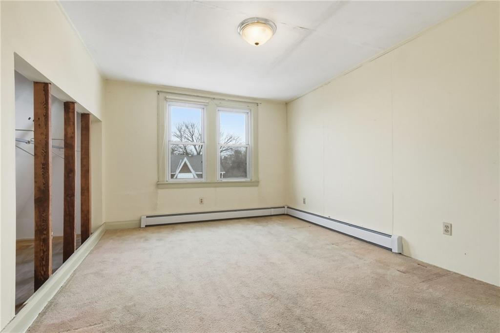 373 Copperfield Avenue Pittsburgh, PA 15210 - Photo 25 of 39 an empty room with windows