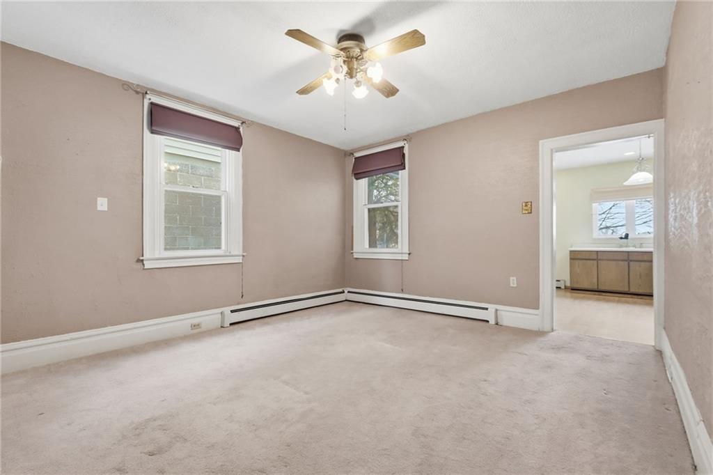 373 Copperfield Avenue Pittsburgh, PA 15210 - Photo 10 of 39 a view of an empty room with a window