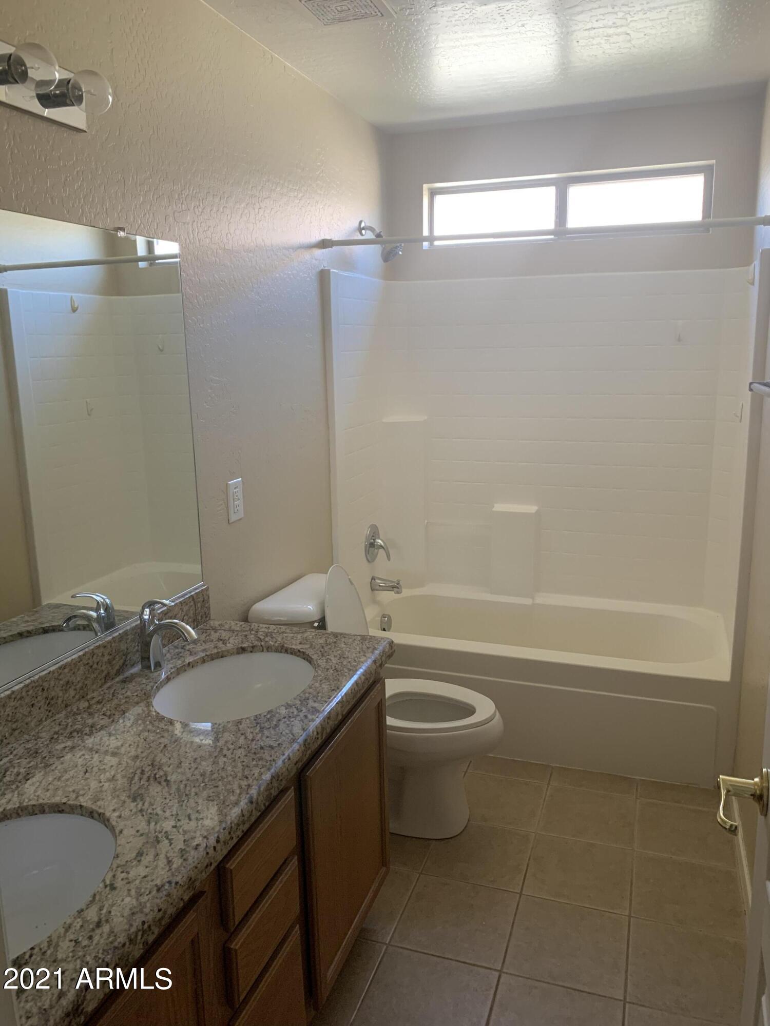 11832 West Dos Rios Drive Sun City, AZ 85373 - Photo 4 of 12 976B13D7-87C7-46BA-8069-C809A61CD4ED