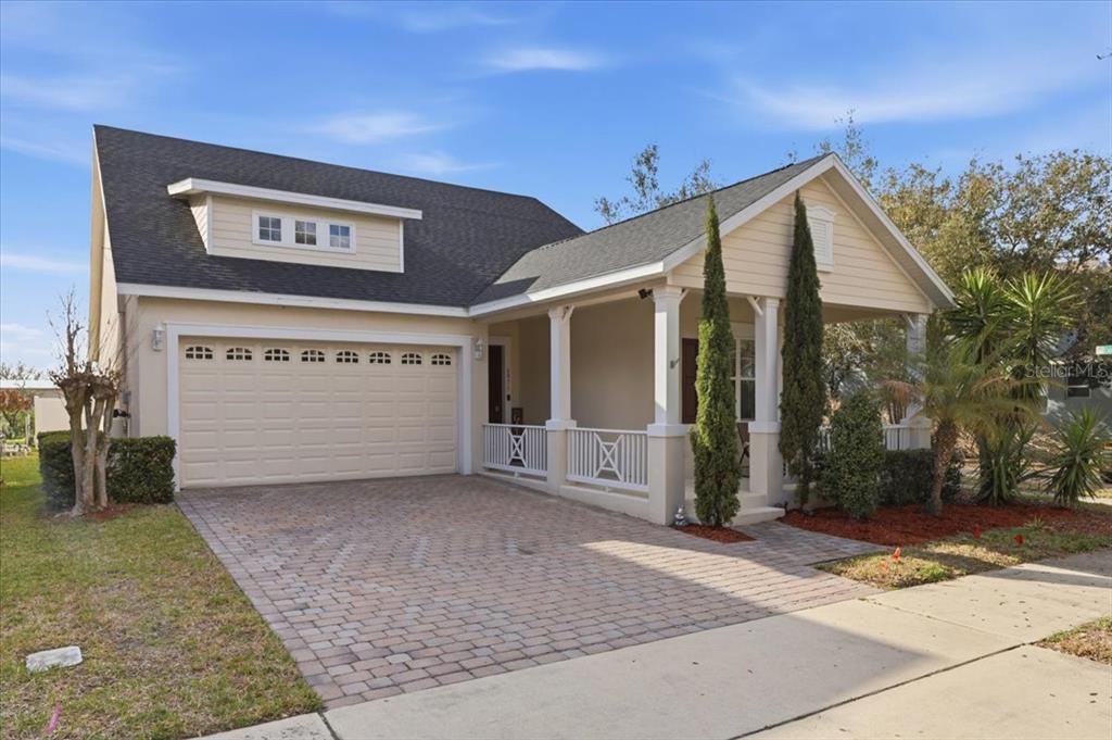 6871 Helmsley Circle Windermere, FL 34786 - Photo 1 of 1 a view of a house with a garage