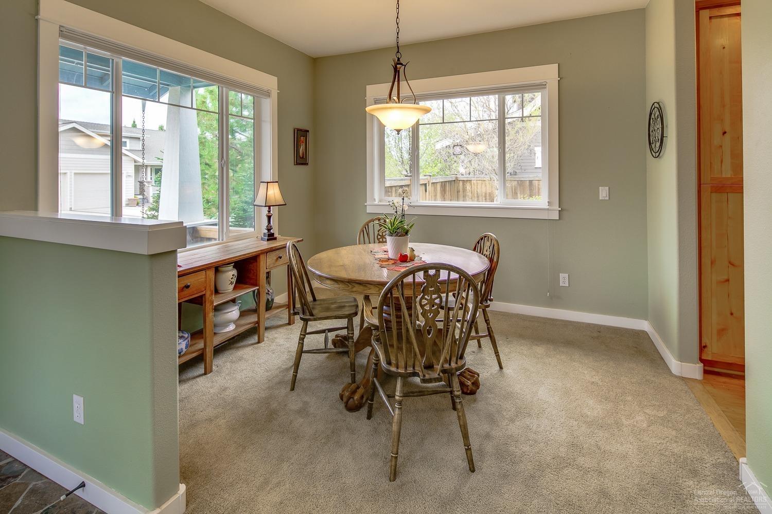 61209 Ridgewater Loop Bend, OR 97702 - Photo 9 of 25 Sunny and bright, east-facing dining are
