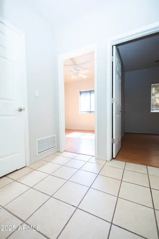 a view of an empty room and window