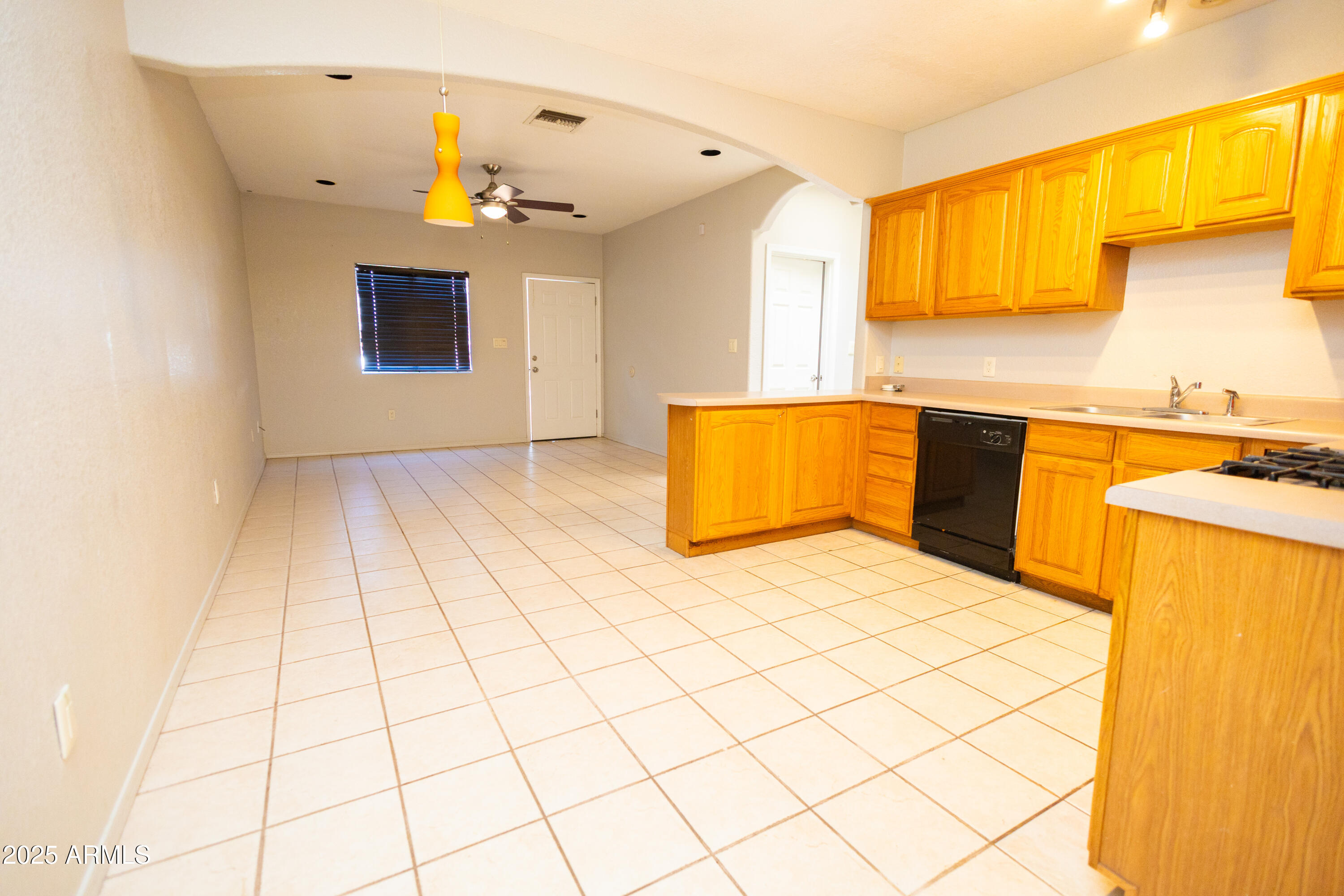 434 North Christine Avenue Douglas, AZ 85607 - Photo 28 of 39 a kitchen with a sink cabinets and window