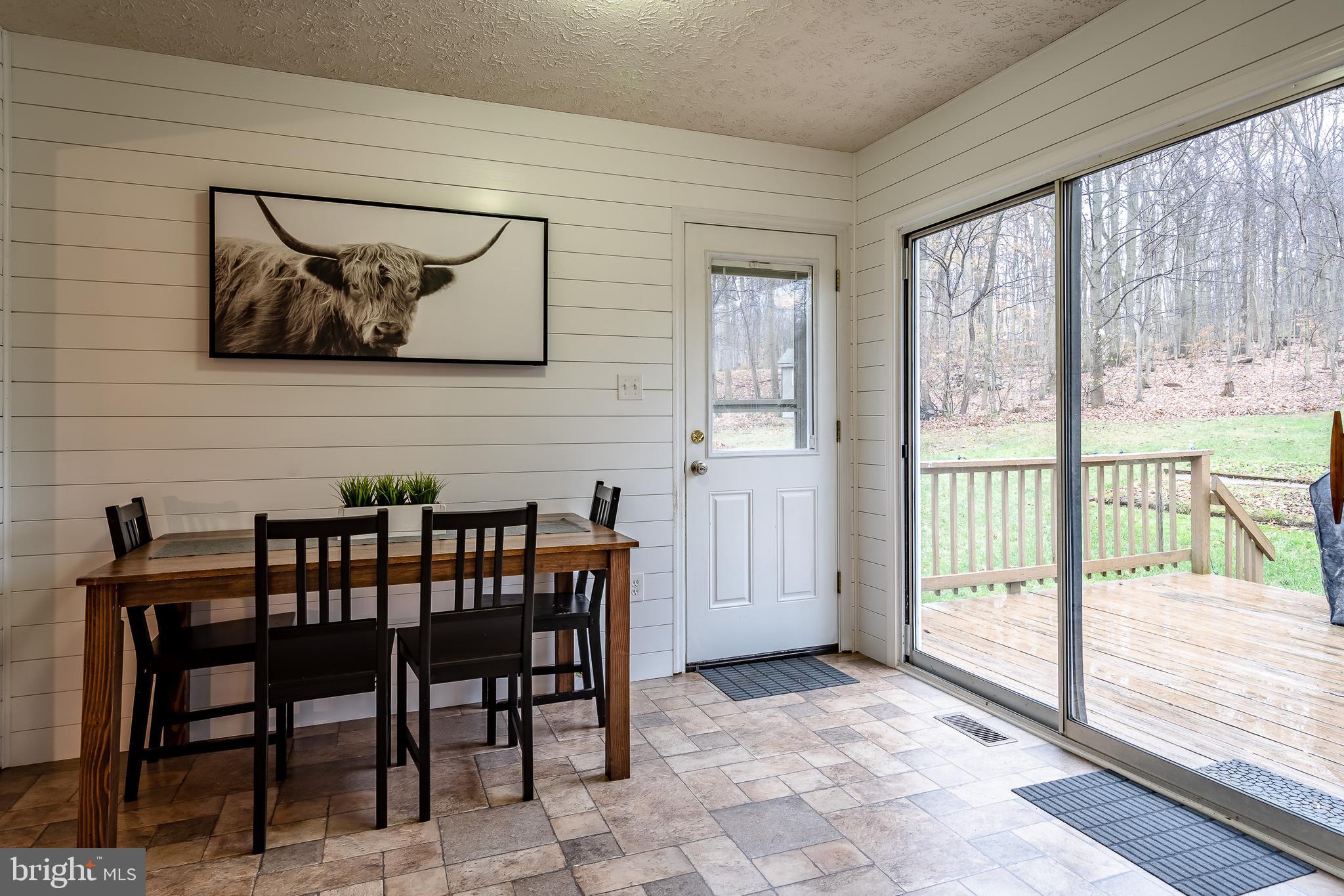 102 Leary Road Honey Brook, PA 19344 - Photo 11 of 40 Dining area with patio doors