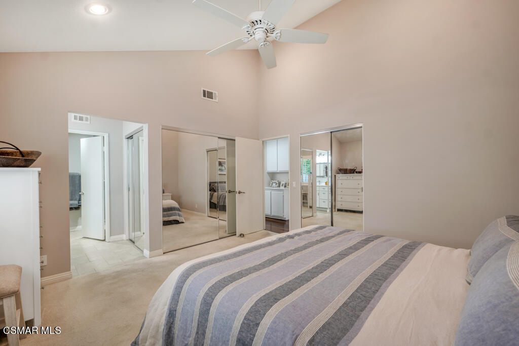 1003 Thistlegate Road Oak Park, CA 91377 - Photo 19 of 36 a bedroom with a bed and a walk in closet