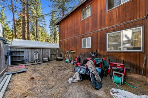 a view of a car park in front of house