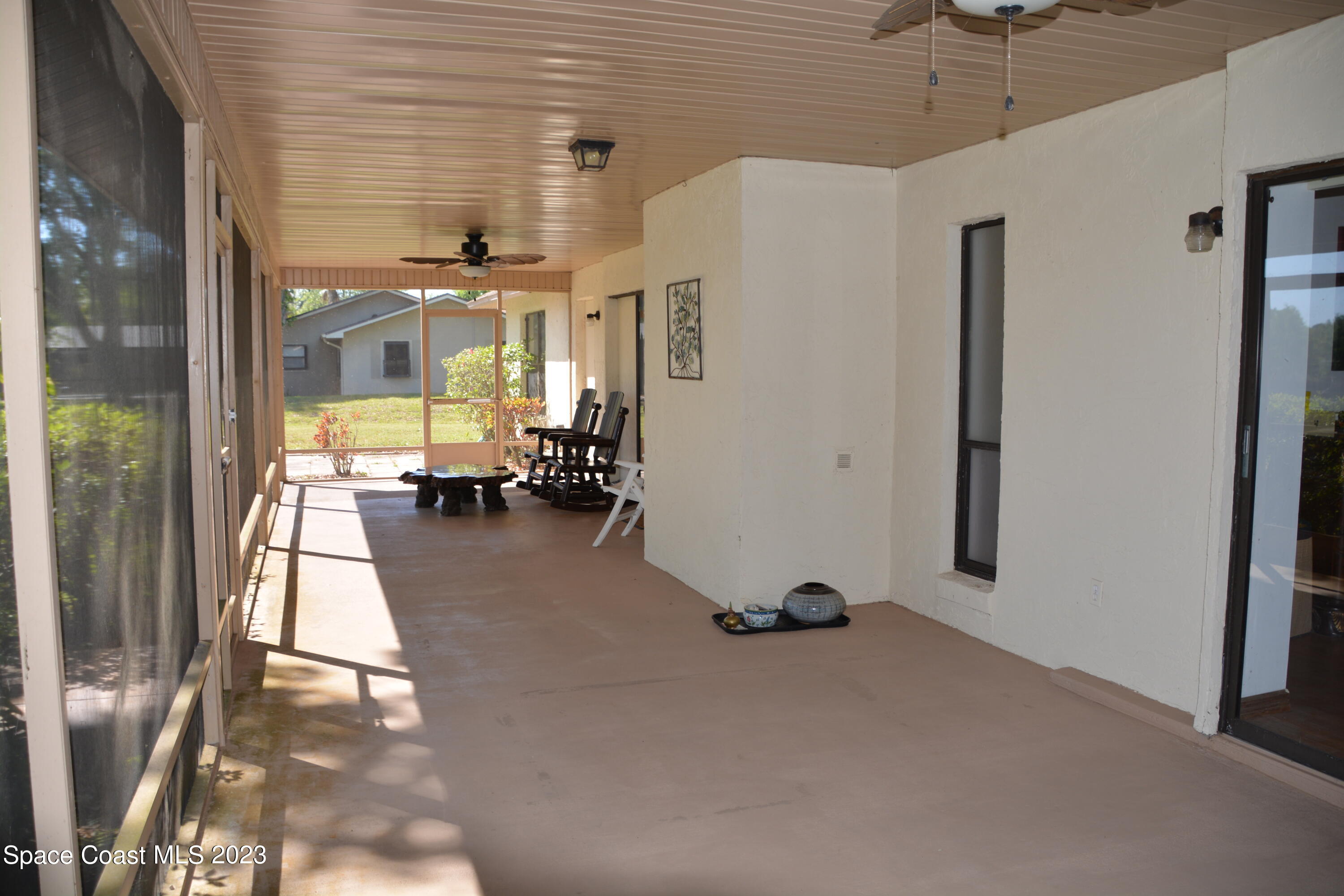 1045 Pine Island Road Merritt Island, FL 32953 - Photo 20 of 42 a view of a living room with furniture