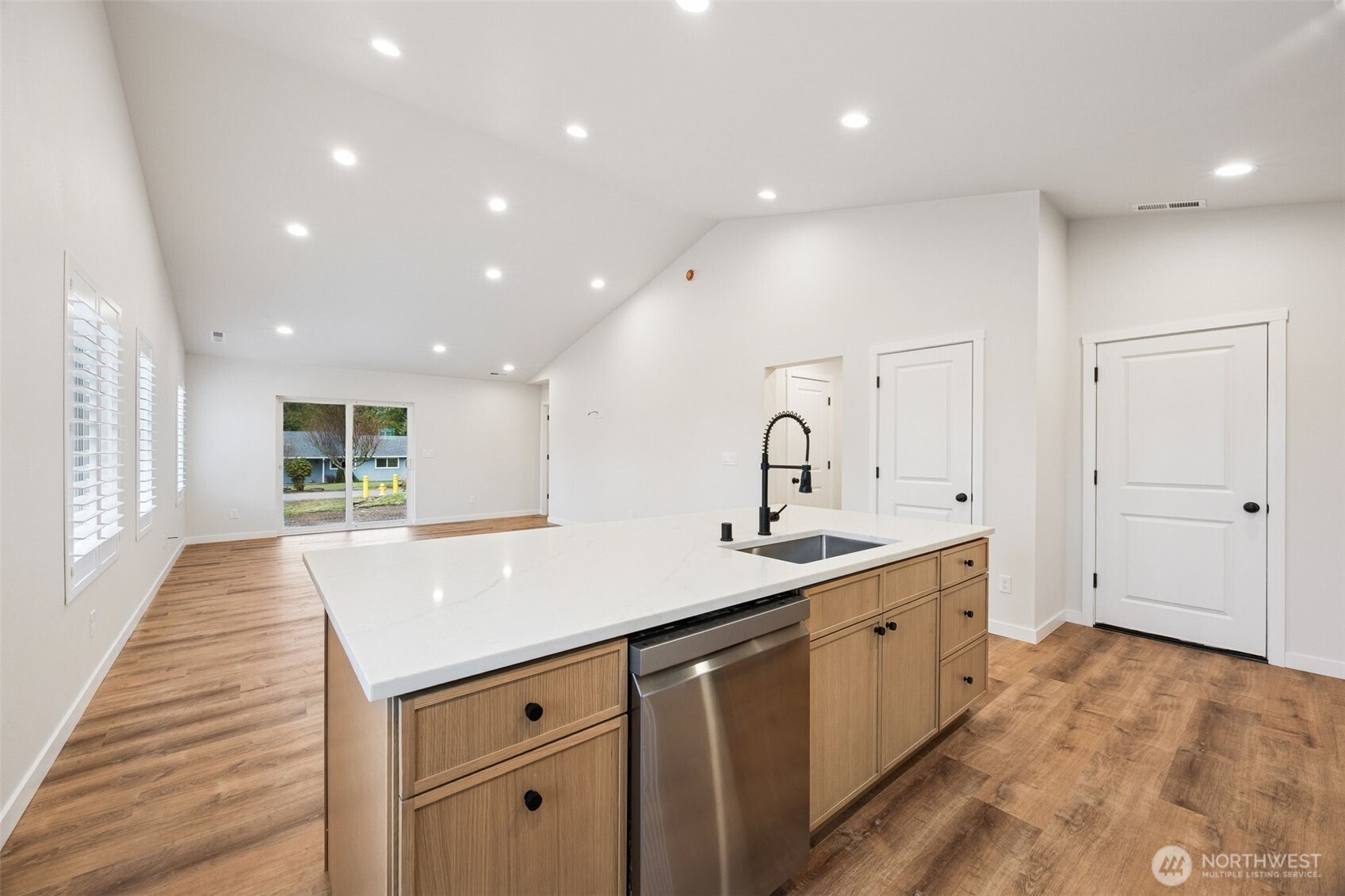 401 Pershing Avenue Carbonado, WA 98323 - Photo 12 of 38 a kitchen with a sink stove and cabinets