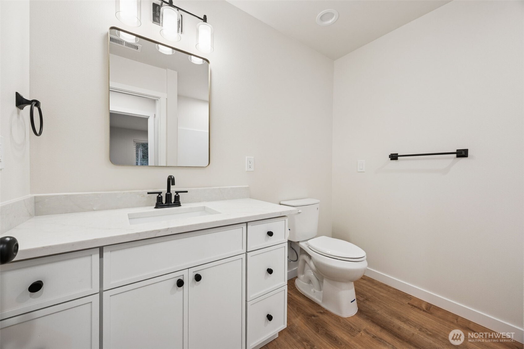 401 Pershing Avenue Carbonado, WA 98323 - Photo 21 of 38 a bathroom with a toilet sink and mirror