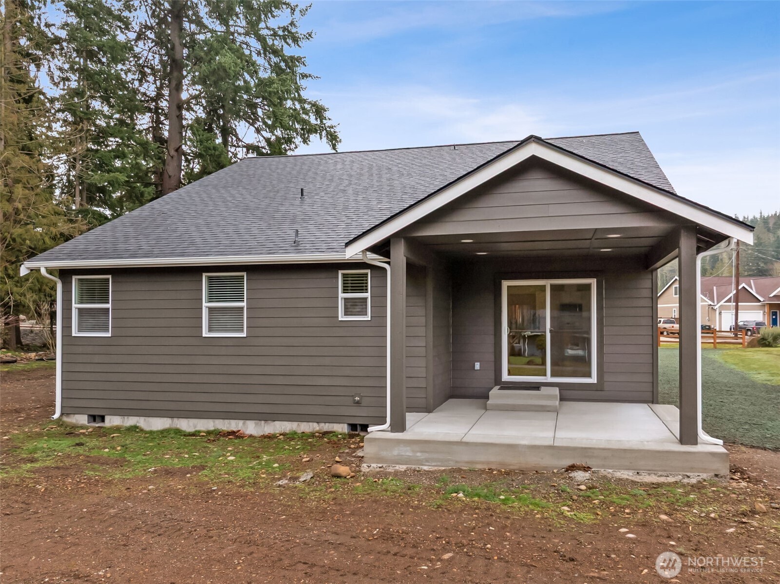 401 Pershing Avenue Carbonado, WA 98323 - Photo 24 of 38 a front view of a house with garden