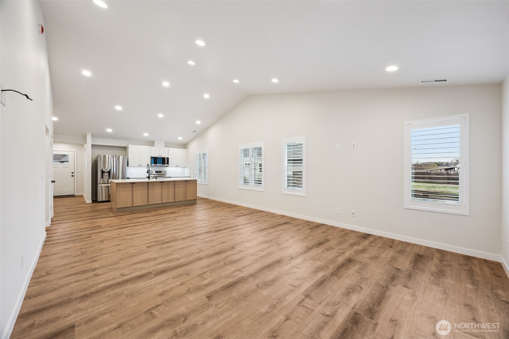 401 Pershing Avenue Carbonado, WA 98323 - Photo 6 of 38 a view of kitchen and hall with wooden floor