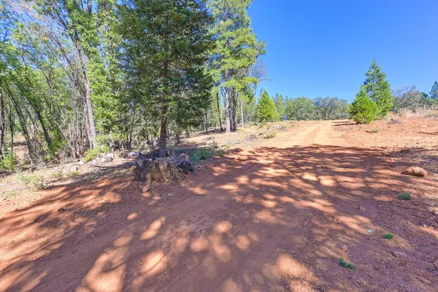 a view of outdoor space with mountain view in back
