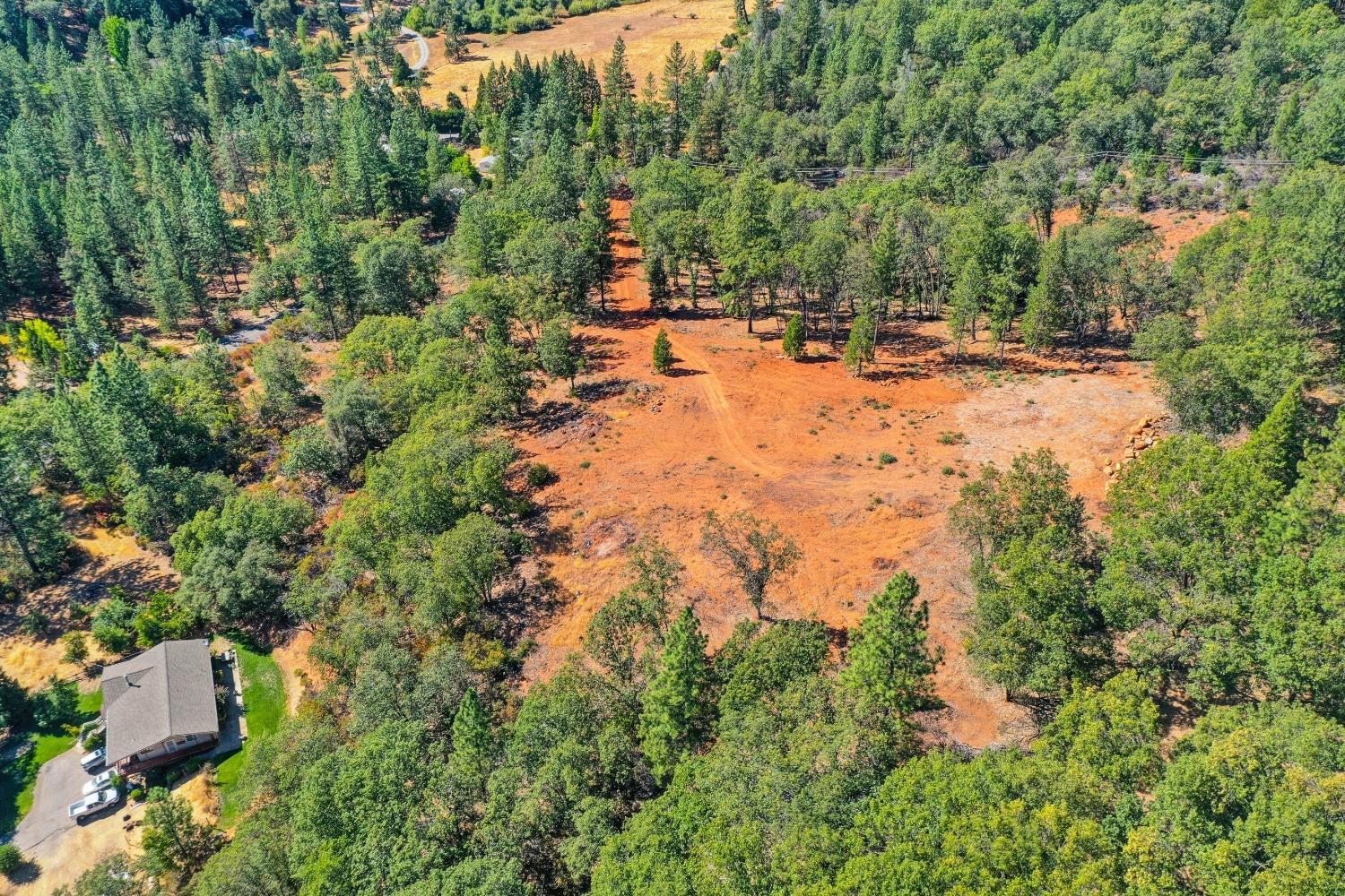 15722 Lower Colfax Road Grass Valley, CA 95945 - Photo 9 of 24 a view of outdoor space with trees all around