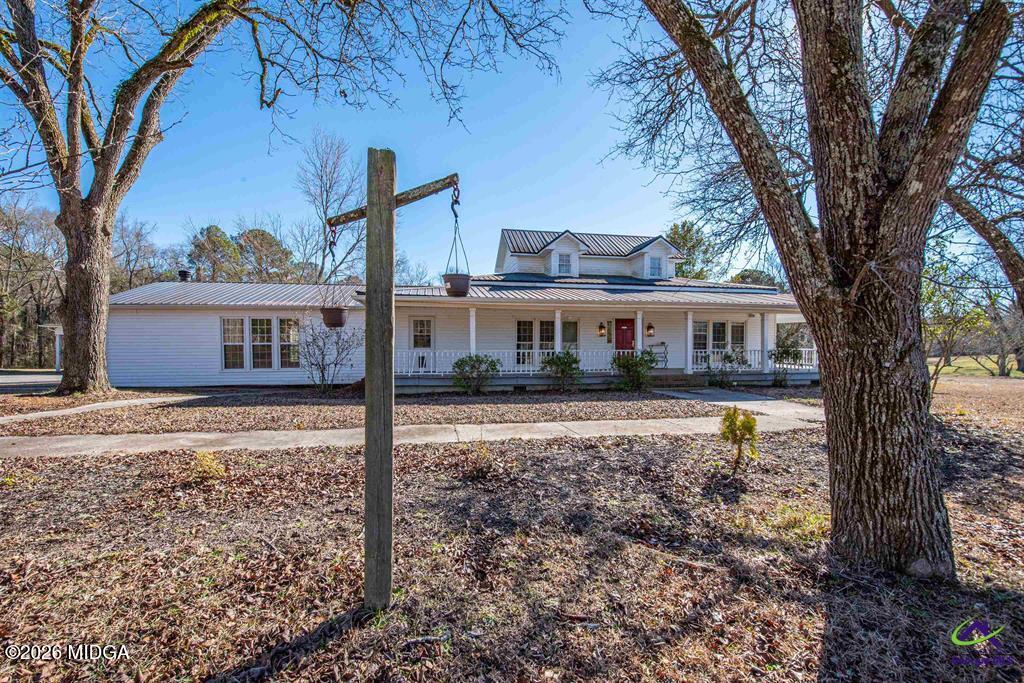 1441 Zenith Mill Road Roberta, GA 31078 - Photo 21 of 80 a front view of a house with garden