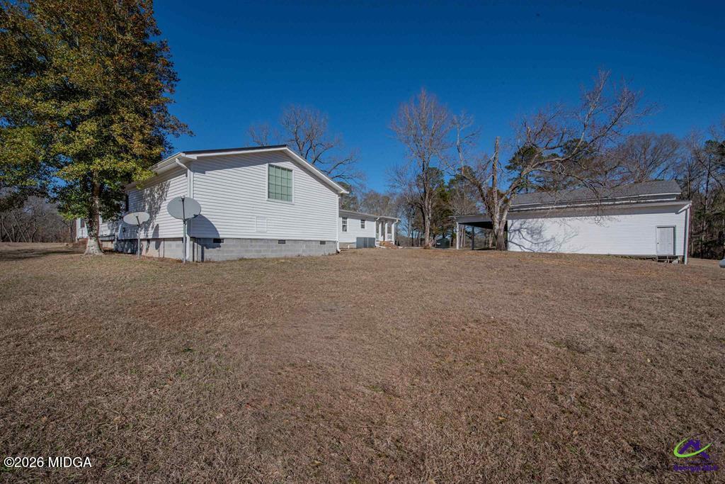 1441 Zenith Mill Road Roberta, GA 31078 - Photo 24 of 80 a view of a house with a yard