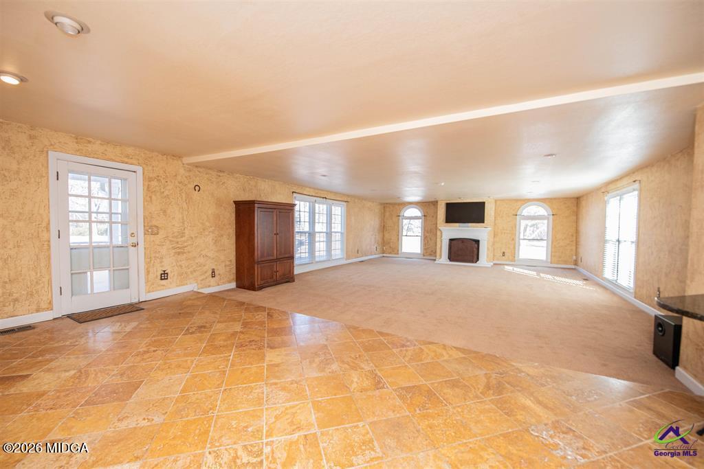 1441 Zenith Mill Road Roberta, GA 31078 - Photo 29 of 80 a view of a livingroom with a staircase