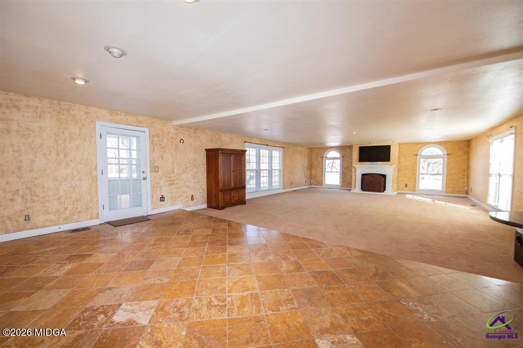 1441 Zenith Mill Road Roberta, GA 31078 - Photo 38 of 80 a view of empty room with windows and entryway