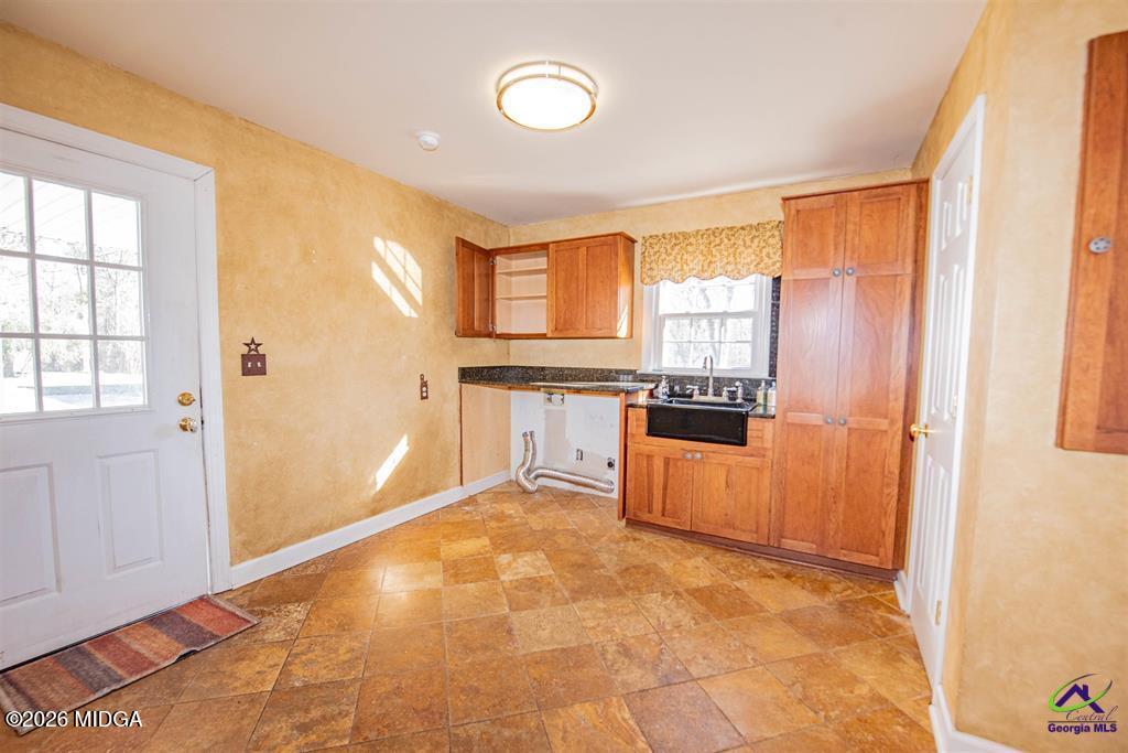 1441 Zenith Mill Road Roberta, GA 31078 - Photo 43 of 80 a view of a kitchen with a sink and cabinets