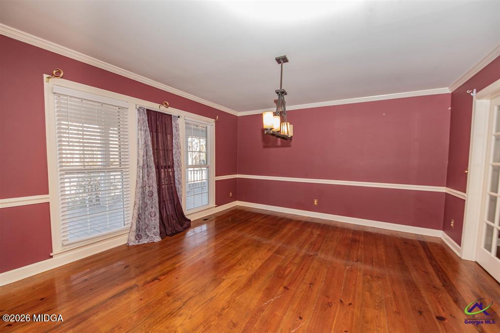 1441 Zenith Mill Road Roberta, GA 31078 - Photo 50 of 80 a view of empty room with wooden floor and fan