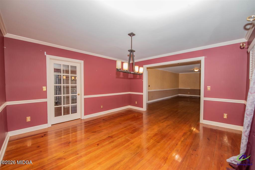 1441 Zenith Mill Road Roberta, GA 31078 - Photo 51 of 80 a view of empty room with wooden floor