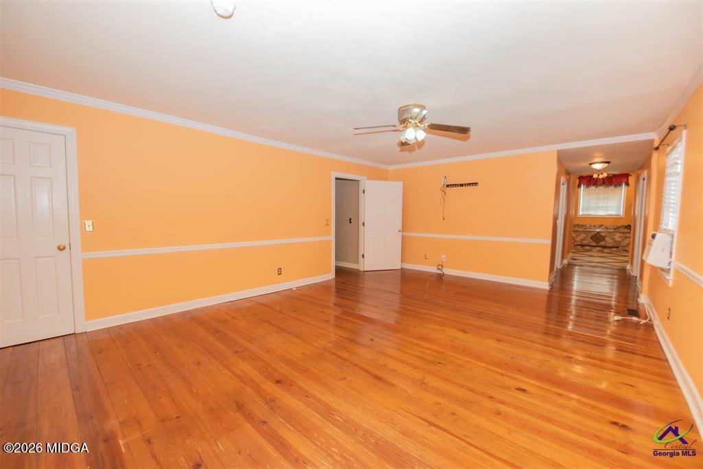 1441 Zenith Mill Road Roberta, GA 31078 - Photo 54 of 80 a view of an empty room with wooden floor