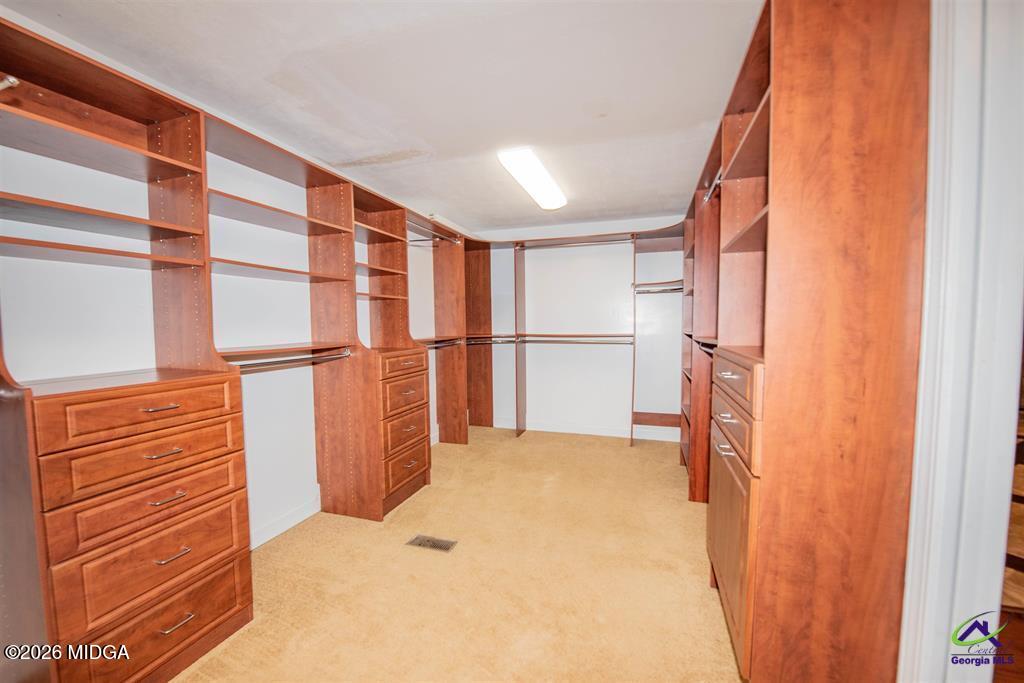 1441 Zenith Mill Road Roberta, GA 31078 - Photo 55 of 80 a view of walk in closet with empty racks