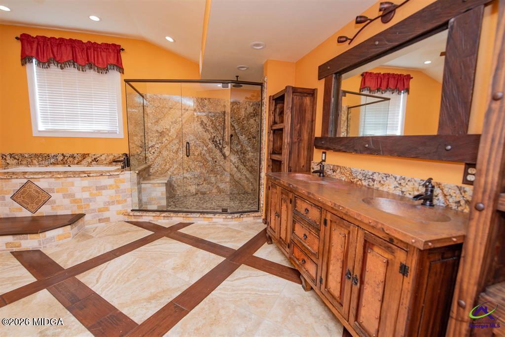 1441 Zenith Mill Road Roberta, GA 31078 - Photo 62 of 80 a bathroom with a sink a mirror and a shower