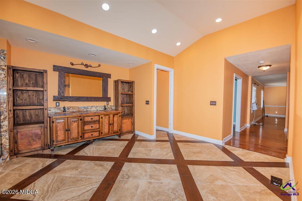 1441 Zenith Mill Road Roberta, GA 31078 - Photo 65 of 80 a living room with stainless steel appliances kitchen island granite countertop a refrigerator and a stove