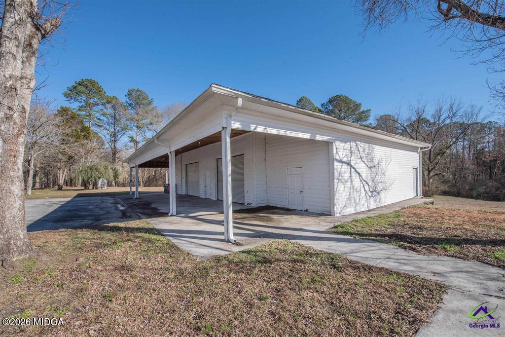 1441 Zenith Mill Road Roberta, GA 31078 - Photo 74 of 80 a front view of a house with a yard