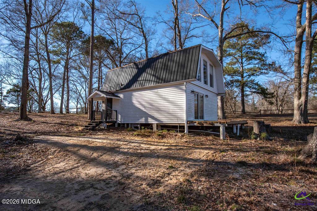 1441 Zenith Mill Road Roberta, GA 31078 - Photo 80 of 80 a house view with a yard