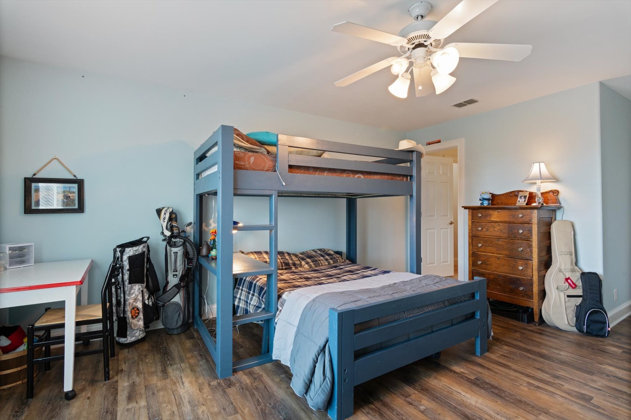 2910 Sulphur Springs Road Murfreesboro, TN 37129 - Photo 34 of 44 a bedroom with a bed and a chandelier