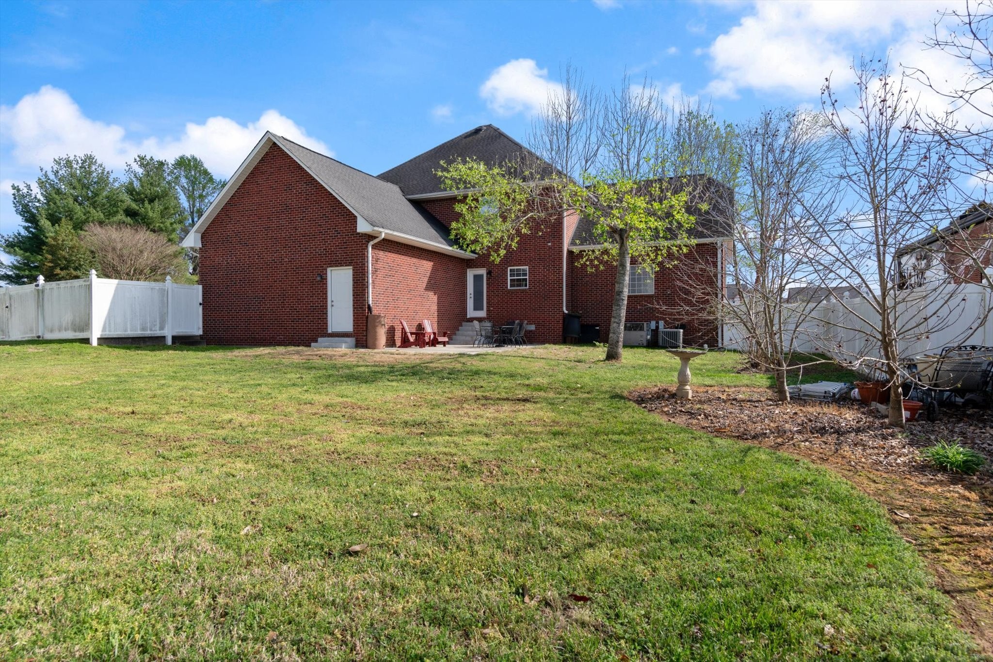 2910 Sulphur Springs Road Murfreesboro, TN 37129 - Photo 43 of 44 a view of a house with a yard and potted plants