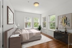 8 Dustin Street, Unit 103 Boston, MA 02135 - Photo 3 of 10 a bedroom with a bed and a window