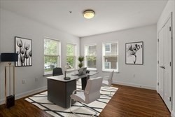 8 Dustin Street, Unit 103 Boston, MA 02135 - Photo 4 of 10 a living room with furniture